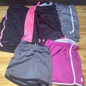 Woman’s under Armour lot of shorts size large